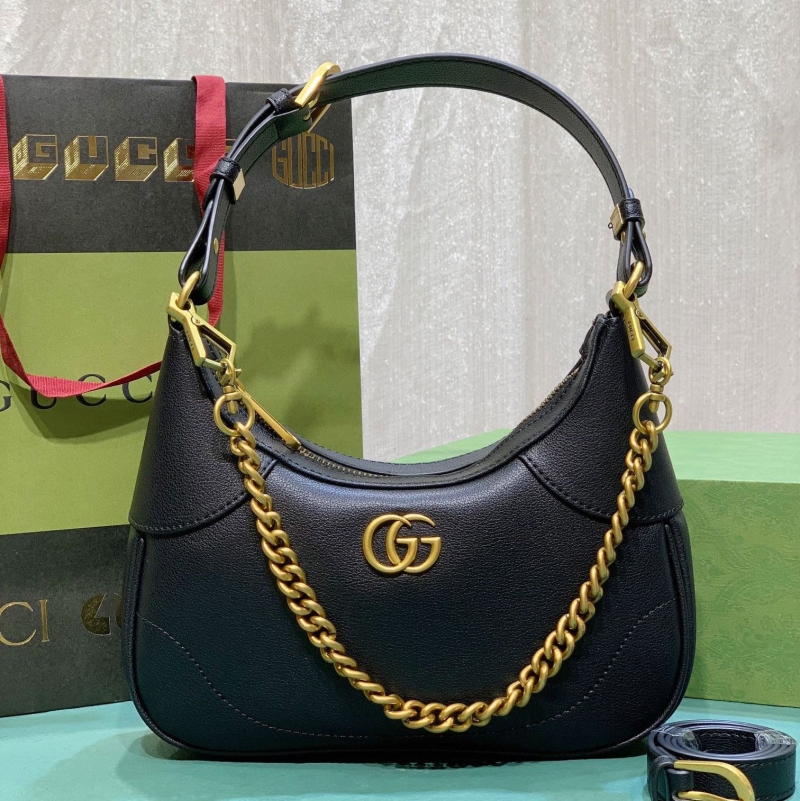 G*u*i top handle bags